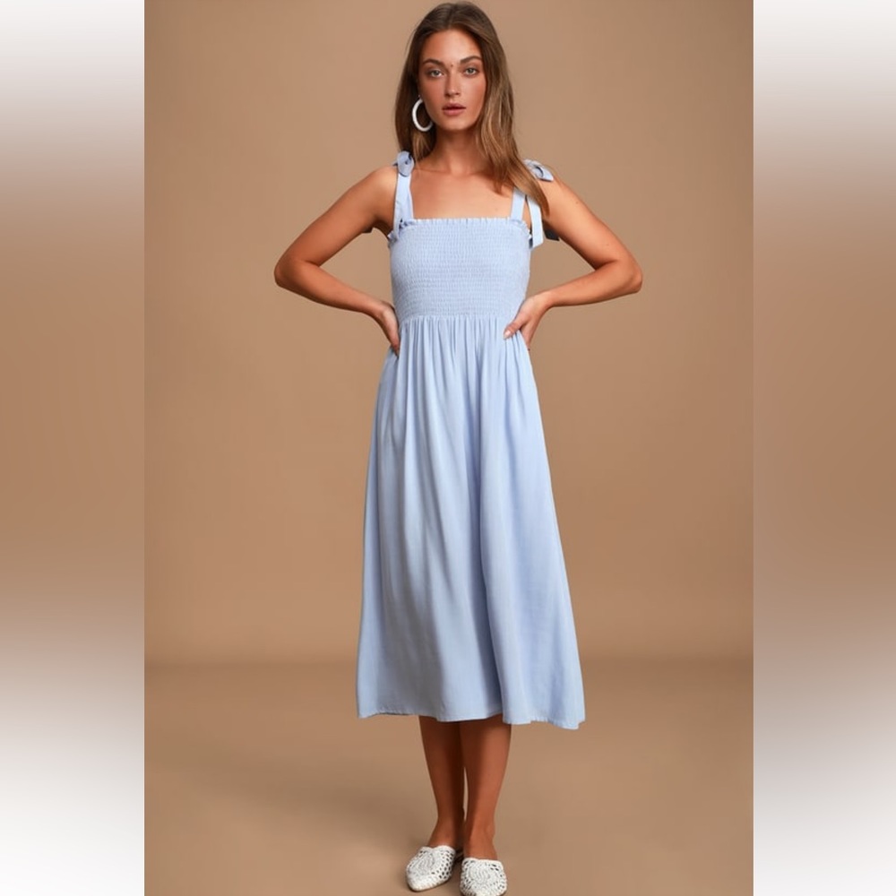 Looking up light blue smocked tie strap midi dress